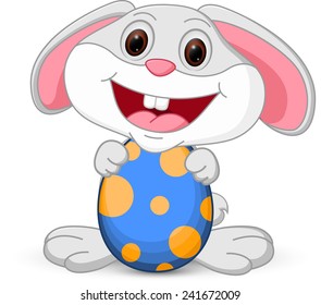 Easter cute bunny holds egg 