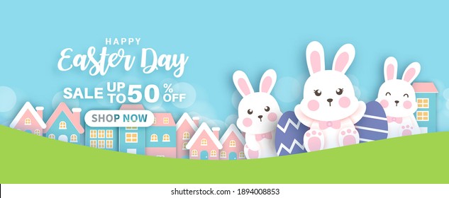 Easter day background and banner with  cute rabbiits and easter eggs.