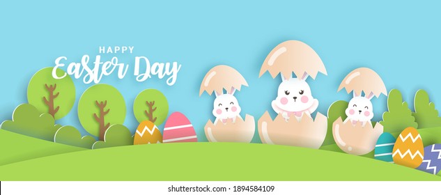 Easter day background and banner with  cute rabbiits and easter eggs.