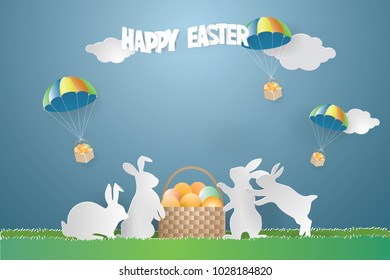 EASTER day concept with eggs in basket  tied with white rope parachute from the sky and Rabbit family on green grass in spring season,vector and illustration.