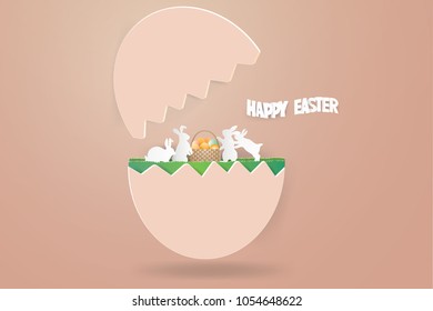 Easter day concept.Eggs in basket on grass surrounded by family rabbit  in nature background ,paper craft style,vector and illustration.