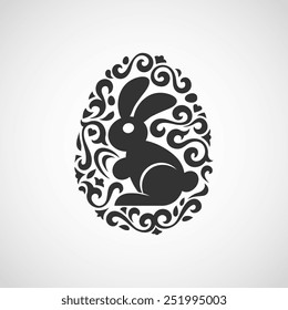 Easter decoration egg silhouette with rabbit, isolated vector illustration icon on a white background.

