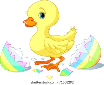 Easter duckling jumping out from broken egg