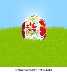 Easter egg against grass and sky