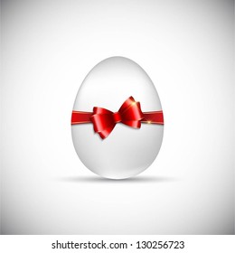 Easter egg background with glossy red ribbon