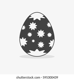 Easter egg In black white style on an isolated background with stars sitting.