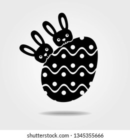 Easter egg with bunny icon isolated on white background.