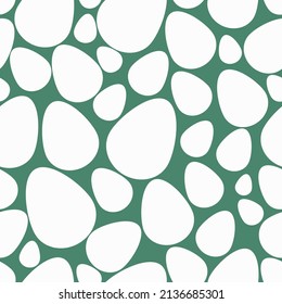 Easter egg. Chicken egg is white. Repeating vector pattern. Isolated green background. Flat style. Seamless holiday ornament. Easter background from eggs. Happy Easter. Fragile shell. 