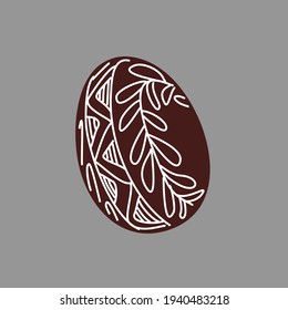 Easter egg colored with onion peel. Traditional Ukrainian national motives of the drawing. Handmade ethnic patterns