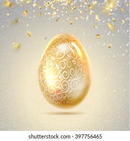 Easter egg with curves of ribbon confetti.