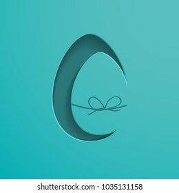 Easter egg cut in the blue paper