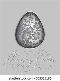 The Easter egg with a floral pattern ornament. Isolated vector egg embossed on a paper. With a elegant silver typography.
