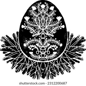 Easter egg with a flower pattern in the nest. Black element, rough surface, grunge texture, linocut style, scandinavian style. Country style, folk art. Cut out the elements. Element for design.