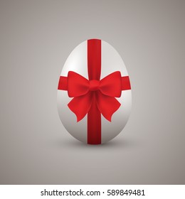 Easter egg with gift bow