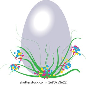 
Easter egg in the grass with flowers