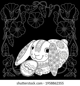 Easter egg hunt in flowers. Little bunny collecting painted eggs 
among flowers, a black and white vector illustration for a coloring book. Art therapy coloring page.
