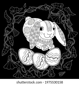Easter egg hunt in flowers. Little bunny collecting painted eggs 
among flowers, a black and white vector illustration for a coloring book. Art therapy coloring page.