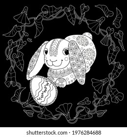Easter egg hunt in flowers. Little bunny collecting painted eggs 
among flowers, a black and white vector illustration for a coloring book. Art therapy coloring page.