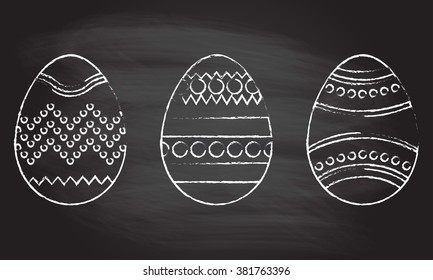 Easter egg icon set isolated on blackboard texture with chalk rubbed background. Vector illustration.