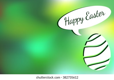 Easter  egg on blurred background wishing Happy Easter