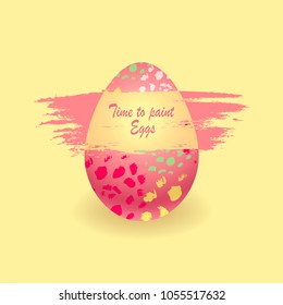 Easter egg in paint stains. Time to paint eggs.  Creative design. Concept preparing to celebrate Easter.