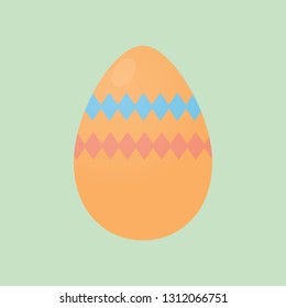 Easter egg with painted colors on green background.