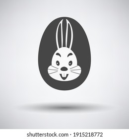 Easter Egg With Rabbit Icon. Dark Gray on Gray Background With Round Shadow. Vector Illustration.