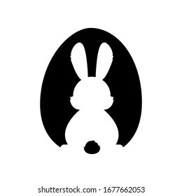 Easter egg shape with bunny silhouette. Rabbit inside a egg, isolated.