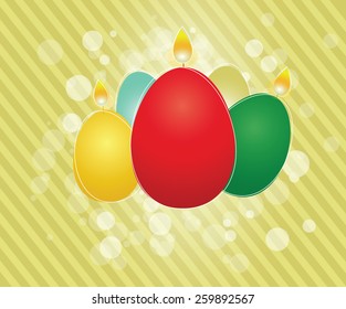 Easter egg shaped candles on a golden background