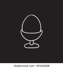 Easter egg in stand vector sketch icon isolated on background. Hand drawn Easter egg in stand icon. Easter egg in stand sketch icon for infographic, website or app.