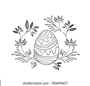 easter egg surrounded by branches in monochrome silhouette