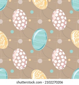 Easter egg vector seamless pattern on brown background