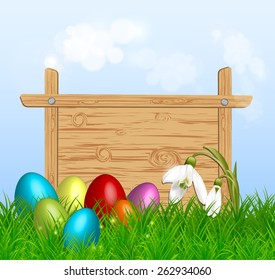 Easter eggs around a wood sign board on green grass. Vector eps10.