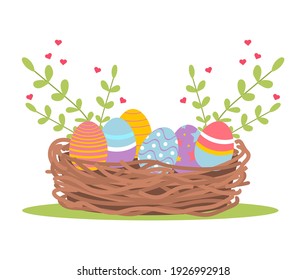 Easter Eggs in basket. Colorful easter eggs in spring nest