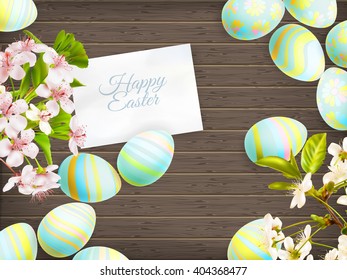 Easter eggs in beautiful and different colors lie on wooden background. EPS 10 vector file included