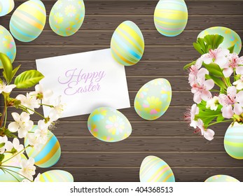 Easter eggs in beautiful and different colors lie on wooden background. EPS 10 vector file included