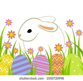 Easter eggs and bunny in grass isolated on white.