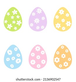 easter eggs colored with white flowers set