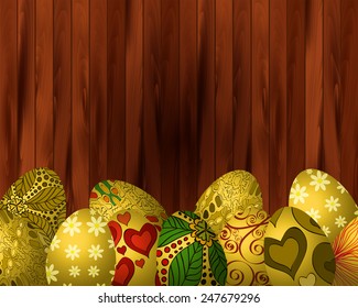 Easter eggs colored wooden background for your design