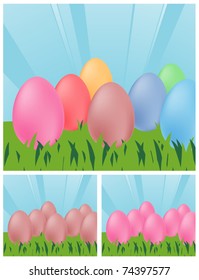 Easter Eggs - Colorful Easter eggs in the grass against a blue sky.
