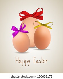 Easter eggs with colorful ribbons