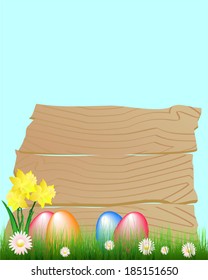 easter eggs and daffodils in garden