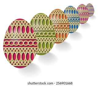 Easter eggs decorated with straw behind