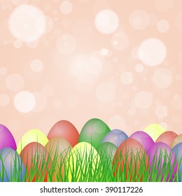 Easter eggs of different colors on the grass.