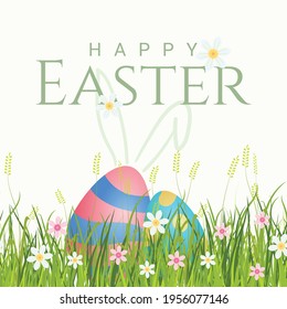 Easter eggs with ears bunny behind grass