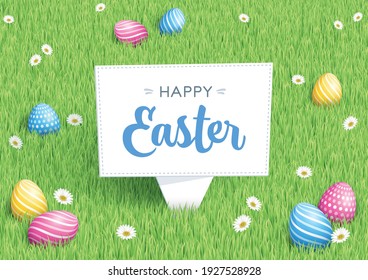 Easter Eggs In Field of Green Grass Background