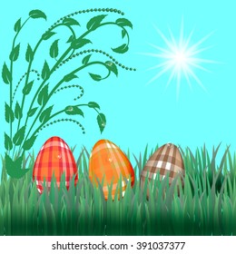 easter eggs with floral branch and drops on grass