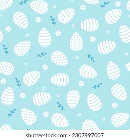 Easter Eggs with flowerss and leaves pattern. Easter holidays on blue background.