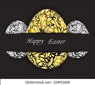 Easter eggs with gold and silver floral pattern.