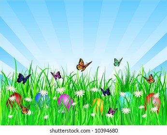 Easter eggs in grass with butterflies